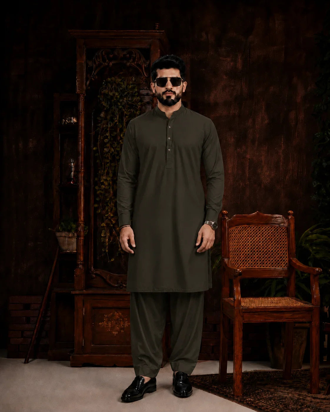 Men's olive green unstitched suiting fabric set for formal and festive wear, featuring a kurta and shalwar